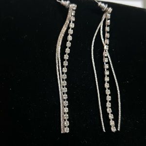 Long crystal and silver chain post style dangling earrings